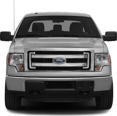 Front view showing chrome grille and rectangular headlights of a full-size pickup