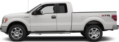 Side view of white extended cab pickup with XTR 4x4 decal and chrome wheels