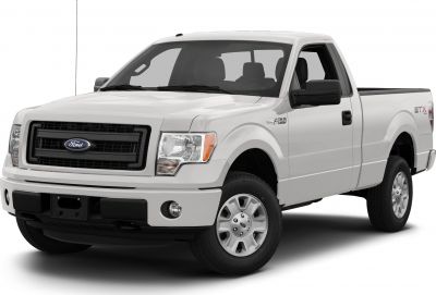 White single cab pickup truck with black grille and steel wheels.