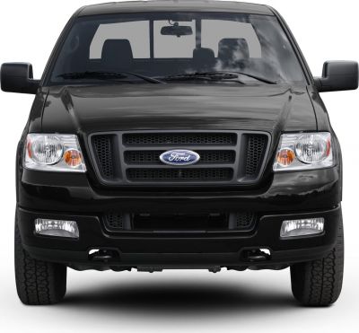 Front view of pickup with distinct grille and headlights