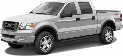Pickup truck with extended cab, rugged tires, and side steps