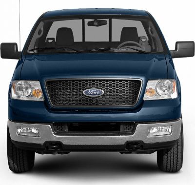 Front view of truck with grille, headlights, side mirrors