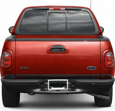 Rear view of red pickup tailgate with window and taillights