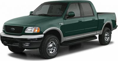 Green extended cab pickup truck with alloy wheels and 4x4 capability.