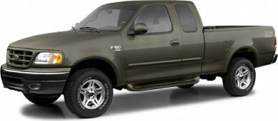 Side view of extended bed pickup with alloy rims