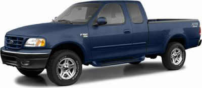 Blue extended cab pickup with rugged tires and classic design