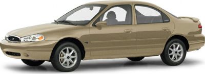 Front side profile of a sedan with silver alloy wheels and beige paint