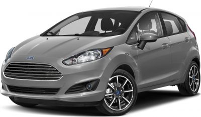 Front angle view with spotlight on alloy wheels and headlights
