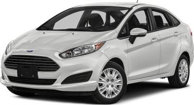 Sleek front grille and aerodynamic compact sedan design