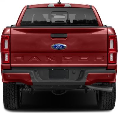 Rear view of pickup with embossed tailgate and vertical taillights