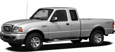 Silver extended cab pickup truck with 4x4 and chrome wheels