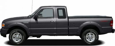 Extended double cab pickup truck with rugged wheel arch flares and long bed.