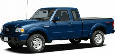 Side profile of an extended cab pickup truck with a covered bed.