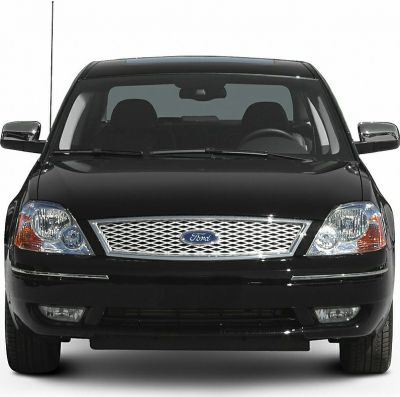 Front view with chrome mesh grille and dual headlamps