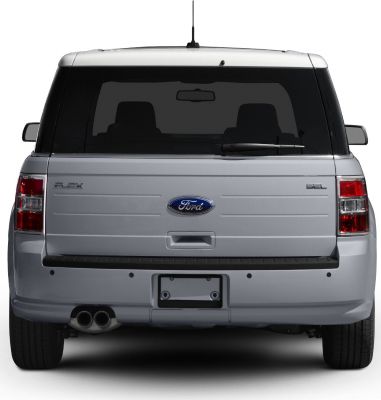 Rear view with dual exhaust, tailgate, and rear window wiper.