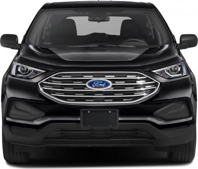 Close-up front view with chrome grille and LED headlights
