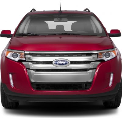 Front view with bold grille and projector headlights