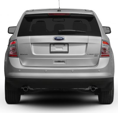 Rear view of SUV with dual exhaust and rear windshield wiper