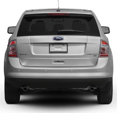 Rear view with dual exhausts and tailgate of an SUV