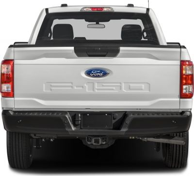 Close-up rear view of pickup truck tailgate and bed with rear window.