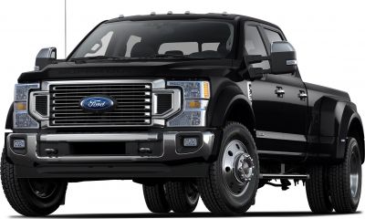 Black crew cab dually truck with front grille and large wheels