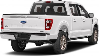 Rear and side view of pickup truck with visible wheels and exhaust