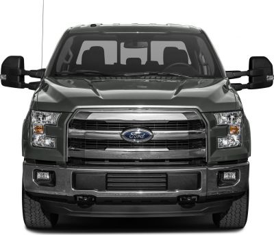 Front view of heavy duty truck with grille and headlights