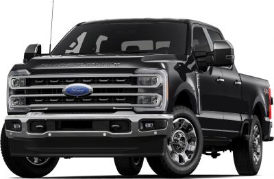 Front view with chrome grille, large side mirrors, four-door long-bed pickup