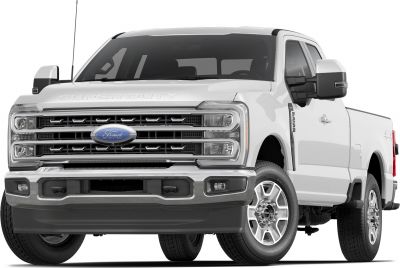 Robust front grille and large extended side mirrors on a heavy-duty pickup