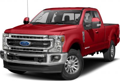Robust front view with distinctive chrome grille and Super Cab long box