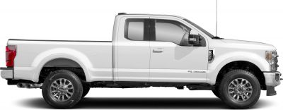 Side profile of a heavy-duty regular cab pickup with long bed and dual exhausts