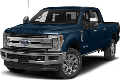 Front and side view of heavy-duty pickup with chrome grille and crew cab