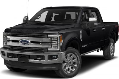 Front view of robust pickup with chrome grille and crew cab