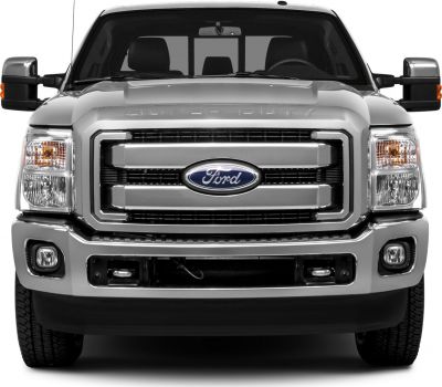 Front view with bold grille and headlights of a heavy-duty pickup