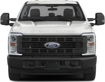 Front view showing grille, headlights, and towing mirrors