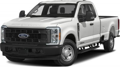 White heavy-duty pickup truck front and side view with extended cab and long bed
