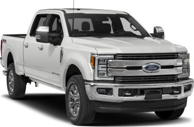 Front view of a heavy-duty pickup with chrome grille and short box.