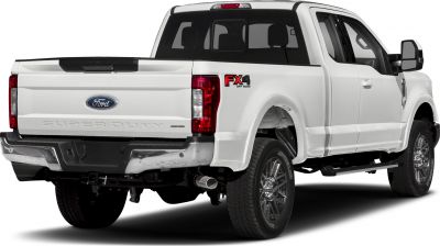 Rear view with tailgate, taillights, FX4 Off-Road badge, chrome bumper, and dual rear wheels.