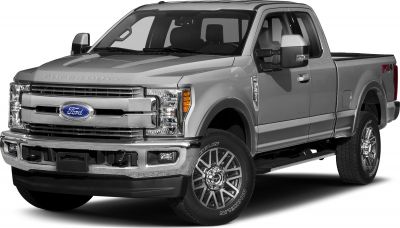 Front three-quarter view of a heavy-duty pickup with chrome grille and long cargo bed