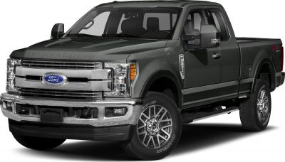 Front-side view showing chrome grille, headlights, and rugged tires of heavy-duty pickup