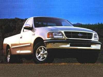 Front angle view of a pickup truck with distinct grille and wheels
