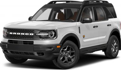 LED round headlights, black roof with roof rails, rugged SUV front side view
