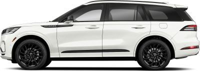 Side profile of white SUV with black multi-spoke alloy wheels and front model badge
