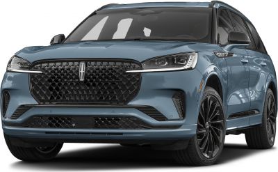Front view with black patterned grille and LED headlights