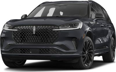 Front grille and LED headlights of a black luxury SUV.