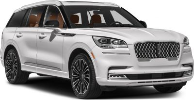 Luxury SUV front view with distinctive grille and LED headlights