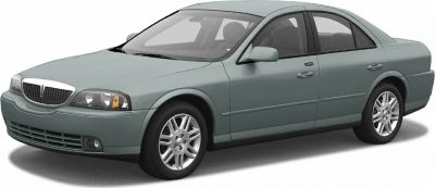 Front-side view of a sedan with alloy wheels and four doors
