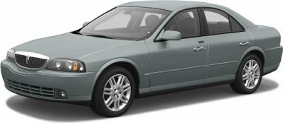 Front side view of a sedan with alloy wheels and side mirrors