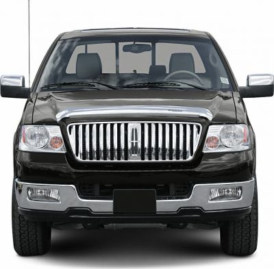 Front view with prominent chrome grille and headlights