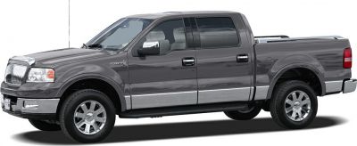 Side profile of extended cab pickup with chrome accents and rugged tires